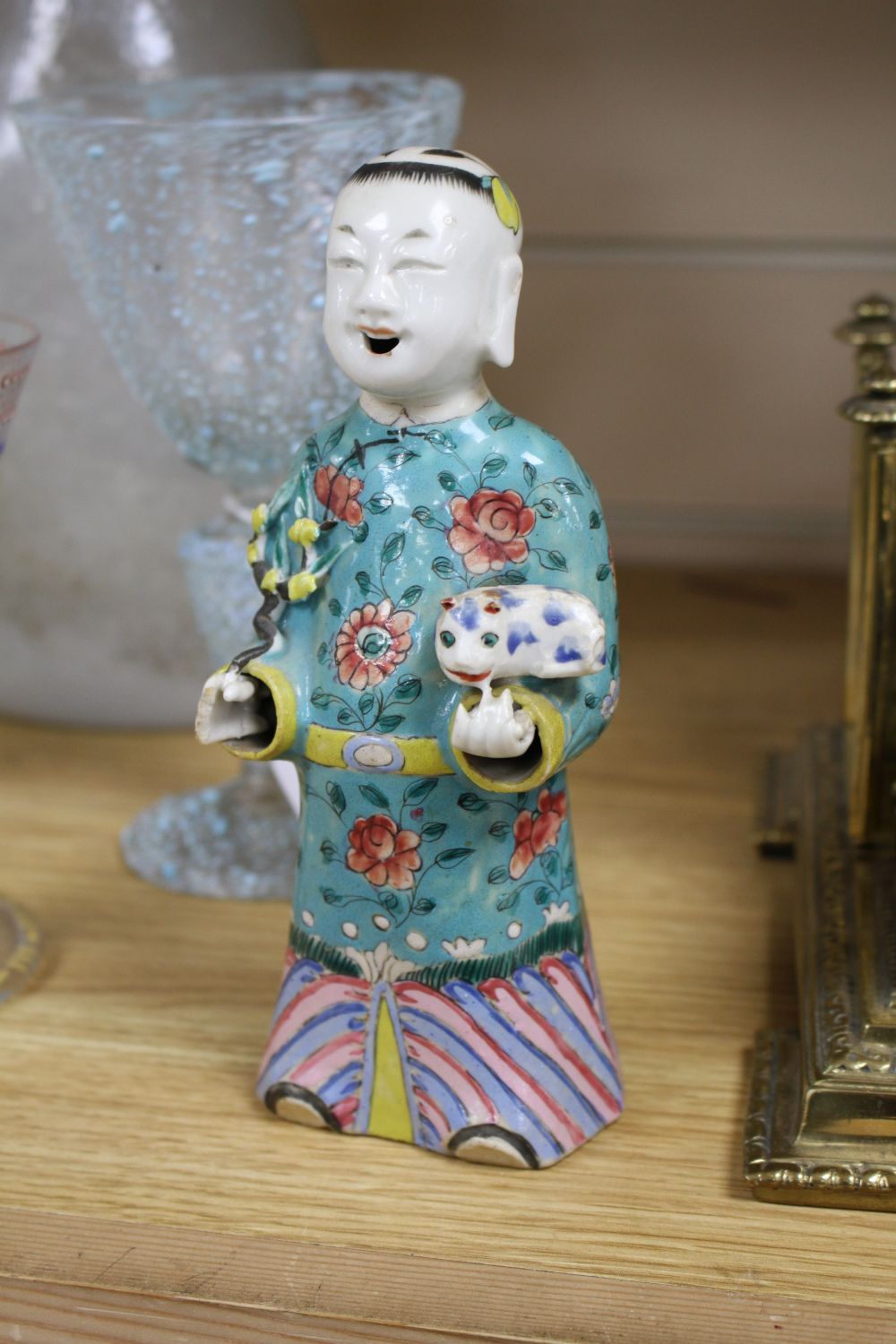 A near pair of Chinese polychrome-decorated figural incense burners and another similar incense burner, Jiaqing period (1796-1820)